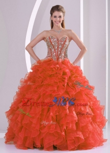 Ball Gown Sweetheart Ruffles and Beaded Decorate Coral Red Quinceanera Gowns