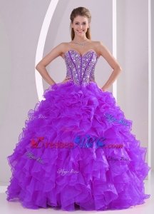 Sweetheart Luxurious Quinceanera Dress With Ruffles And Beaded Decorate