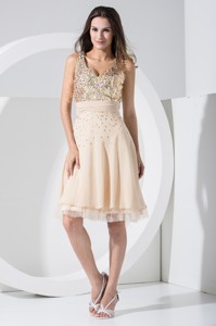 V-neck Knee-length Cocktail Dress With Sequins And Ruched Sash