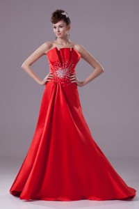 Beaded Sweep Train Prom Dress With Ruffled Strapless Neckline