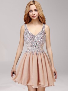 Unique Straps Criss Cross Champagne Prom Dress with Ruffles and Beading
