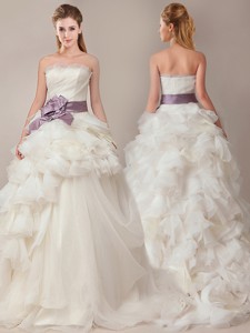 Ball Gown Strapless Sophisticated Ruffled And Sashed Wedding Dress With Brush Train