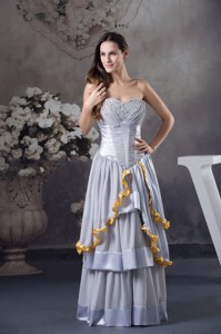 Beaded and Ruched Grey Prom Celebrity Dress with Ruffled Layers