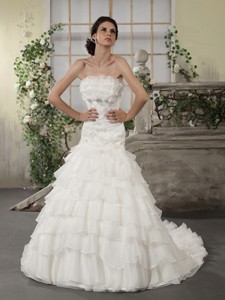 Strapless White Bridal Gowns With Ruffled Layers And Court Train