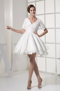 Short Sleeves V-neck Princess Ruched Bridal Gown with Lace Hemline 