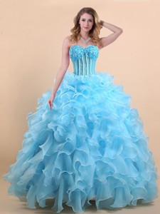 Luxurious Light Blue Organza Prom Gown with Appliques and Ruffles
