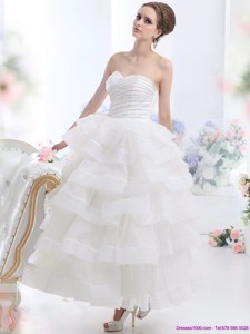 Unique White Wedding Dress With Ruffled Layers And Beading
