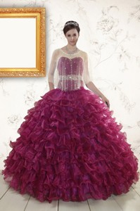 Burgundy Quinceanera Gown With Beading And Ruffles