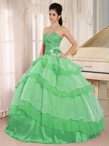Green Sweetheart Beaded Decorate And Ruched Bodice Ruffled Layeres Quinceanera Dress In