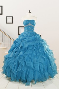 Elegant Strapless Blue Quinceanera Dress With Beading And Ruffles