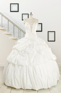 White Taffeta Dress For A Quinceanera With Beading And Pick Ups
